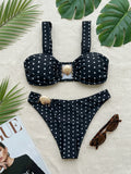 Chic bikini noir et blanc à pois, coupe haute, avec liens sur les côtés